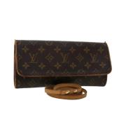 Pre-owned Brunt lerret Louis Vuitton florentinsk clutch