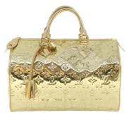 Pre-owned Louis Vuitton i skinn i gull Speedy