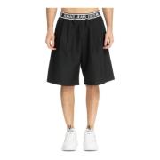 Ensfarget Bermuda-shorts med elastisk linning og logo-lomme