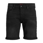 Klassiske svarte shorts med glidelås og knappelukking