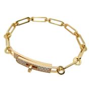 Pre-owned Hermes-armband i gullgult gull