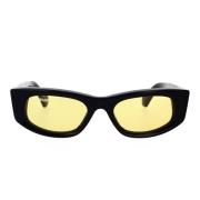 Solbriller med uregelmessig design og gule linser