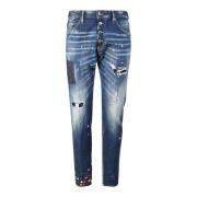Blå Jeans med Ripped Detaljer og Blomsterlapp