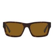 Rektangulære solbriller med skilpaddemønstret innfatning og brune lins...