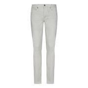 Smal passform hvite jeans med knappelukking
