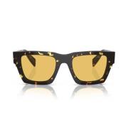 Solbriller med puteform og gule linser