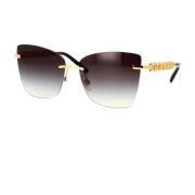 Stilige solbriller med gullramme og grå linser