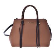 Handbag in black and tan calfskin