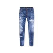 Skater Blå Jeans med Slitte Detaljer og Malingssprut