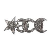 Pre-owned Metal brooches