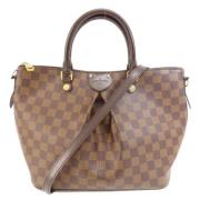 Pre-owned Fabric handbags