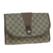 Pre-owned Canvas clutches