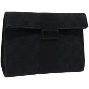 Pre-owned Canvas clutches