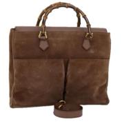 Pre-owned Suede handbags