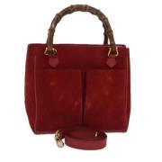 Pre-owned Suede handbags