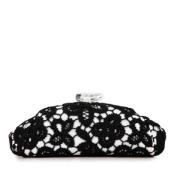 Pre-owned Fabric clutches