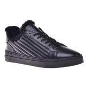 Trainers in black quilted leather and leather