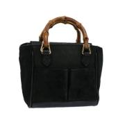 Pre-owned Suede handbags