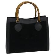 Pre-owned Suede handbags