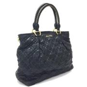 Pre-owned Fabric handbags