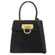 Pre-owned Suede handbags