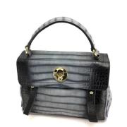 Pre-owned Canvas handbags