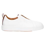 Hvite Slip-On Skinn Sneakers