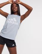 adidas Badge of Sport tank top in sky tint & white