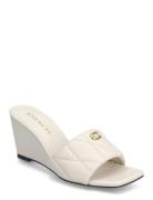 Emma Wedge Cream Coach