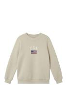 Nlnlusa Ls Bru O-Neck Sweat Beige LMTD