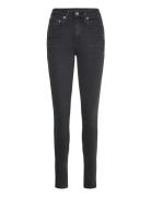 721 High Rise Skinny Flying Into The Fu Bottoms Jeans Skinny Black LEV...