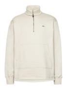 Caspian Half Zip Designers Sweat-shirts & Hoodies Sweat-shirts Cream W...