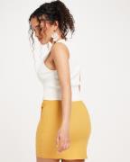 Nelly - Oransje - knot side mini skirt