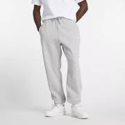 New Balance Joggebukse Fleece Essentials - Grå